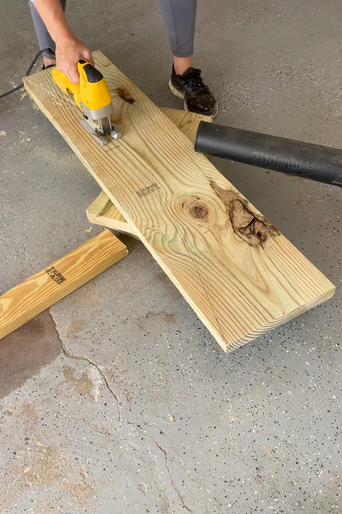 Using a jig saw to cut out an arch. 